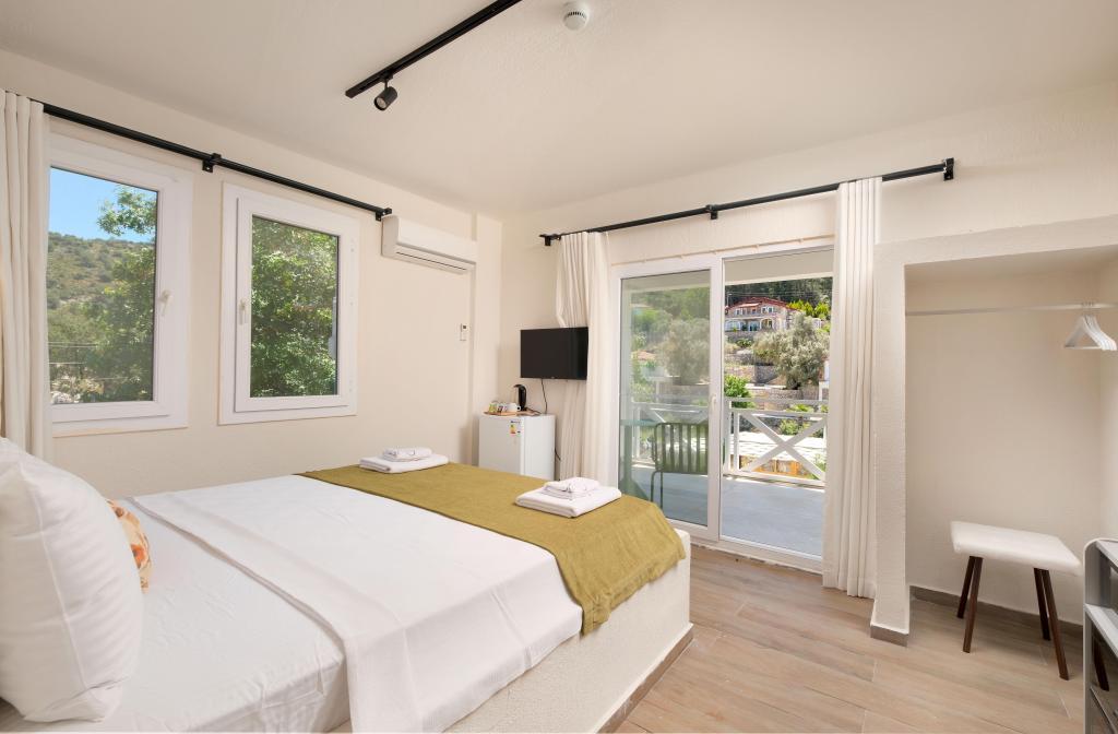 Tütsü Suites Kayaköy — 2