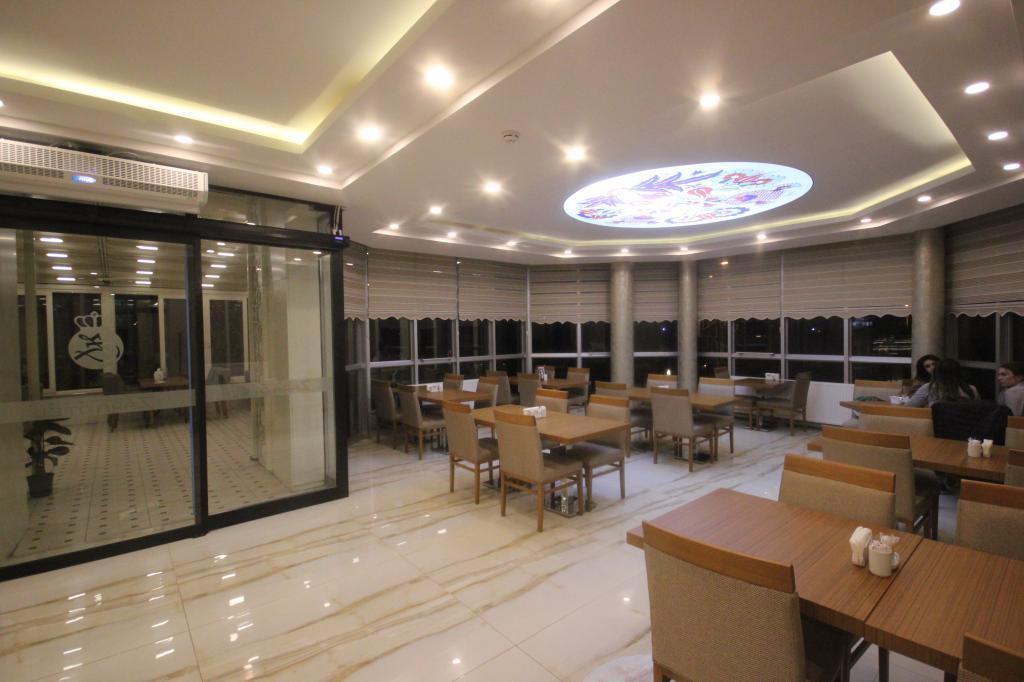 Garden Zara Hotel — 5