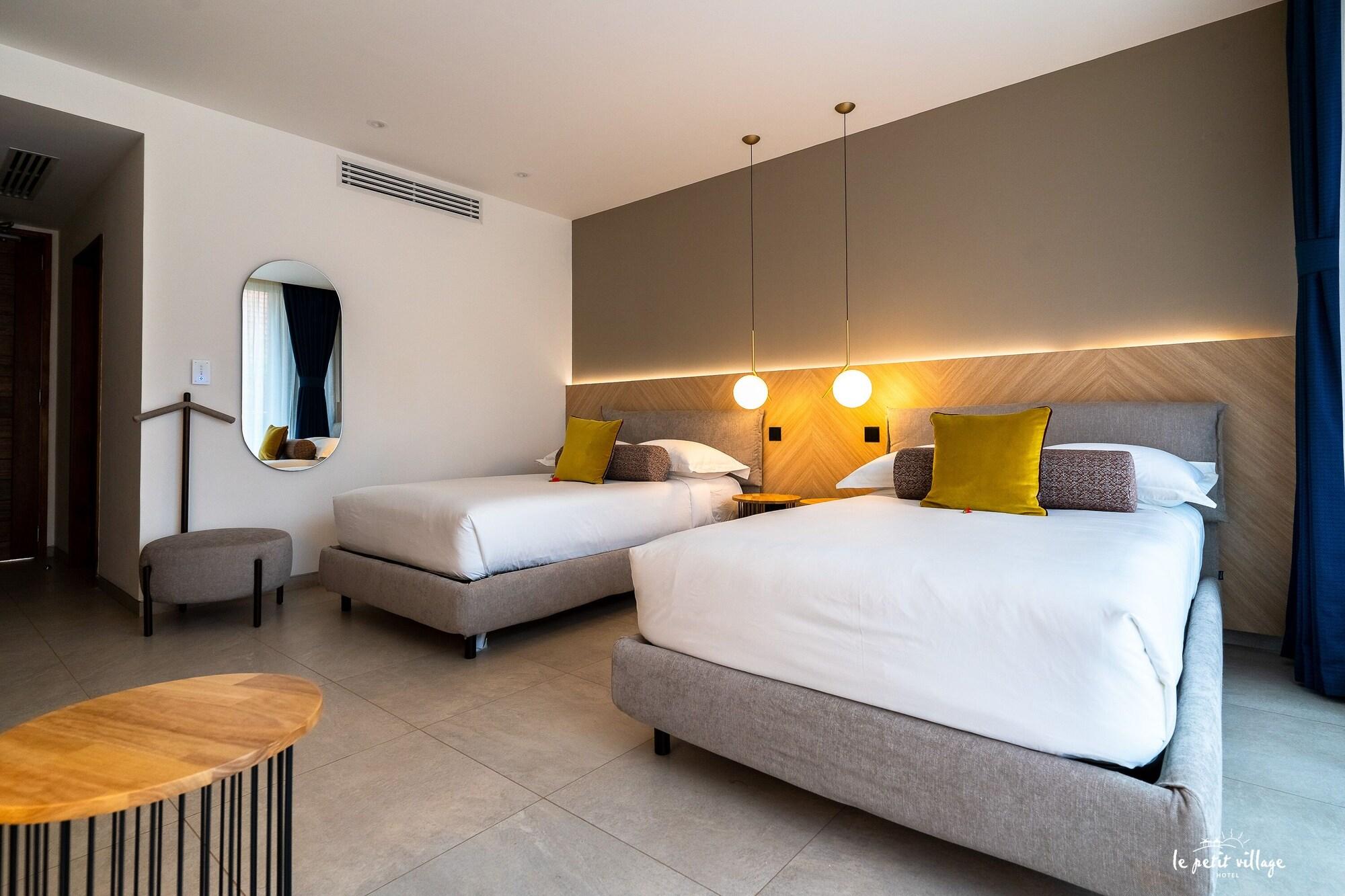 Le Petit Village Hotel — 10