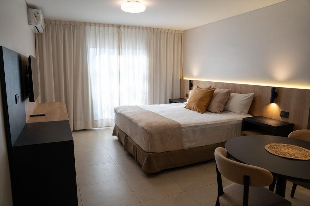 URBANA SUITES — 7