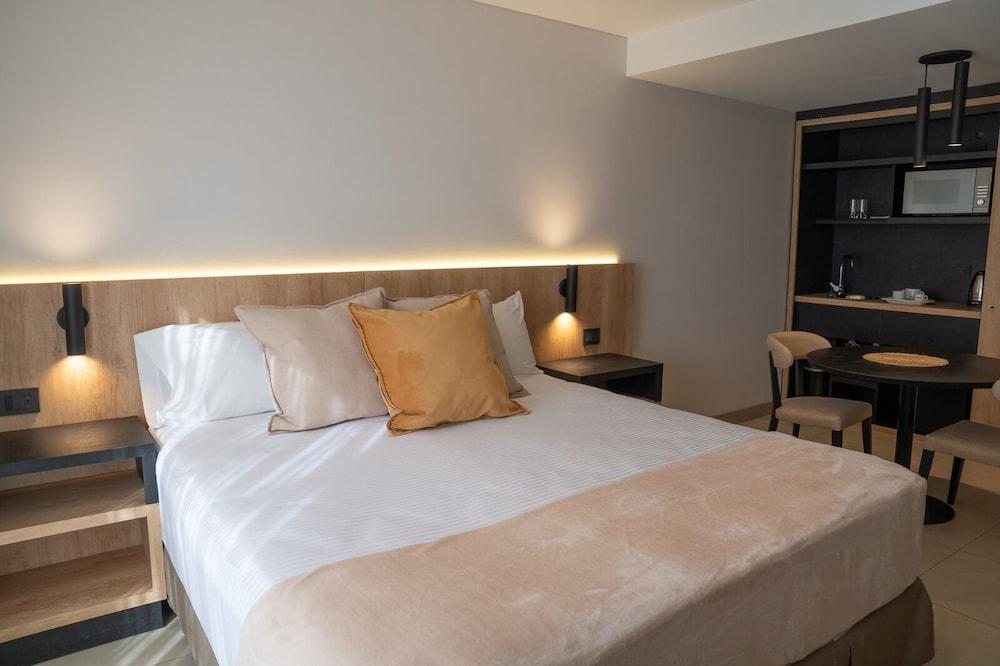 URBANA SUITES — 8
