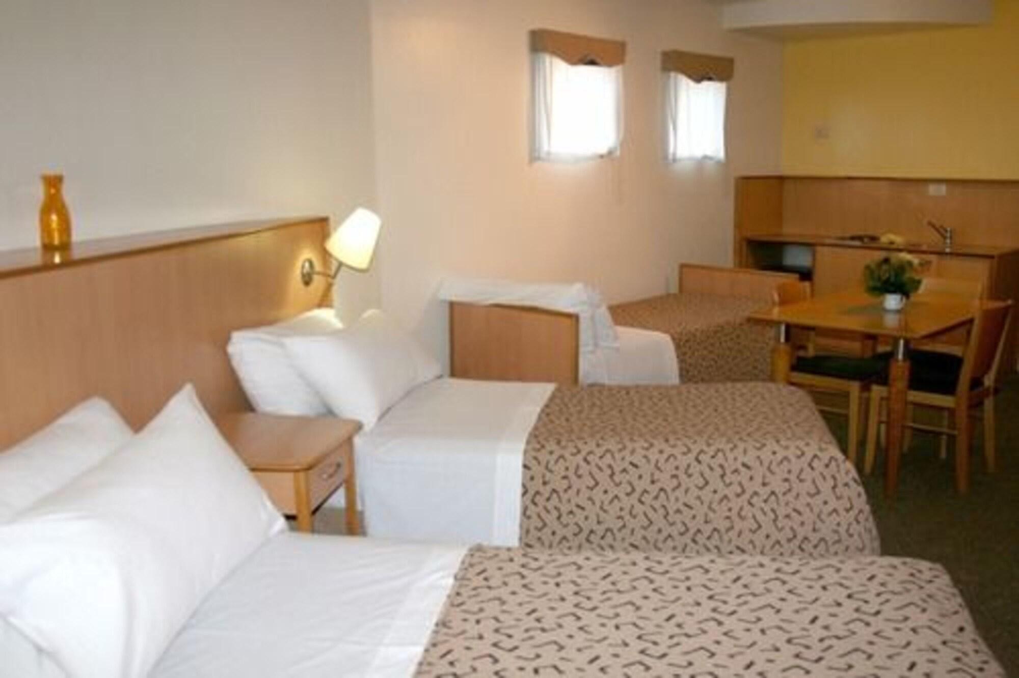 URBANA SUITES — 6