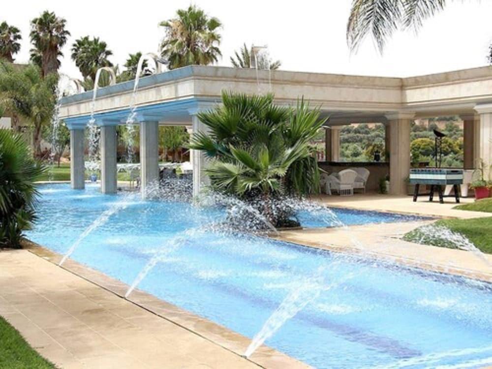 ZAKI HOTEL — 1