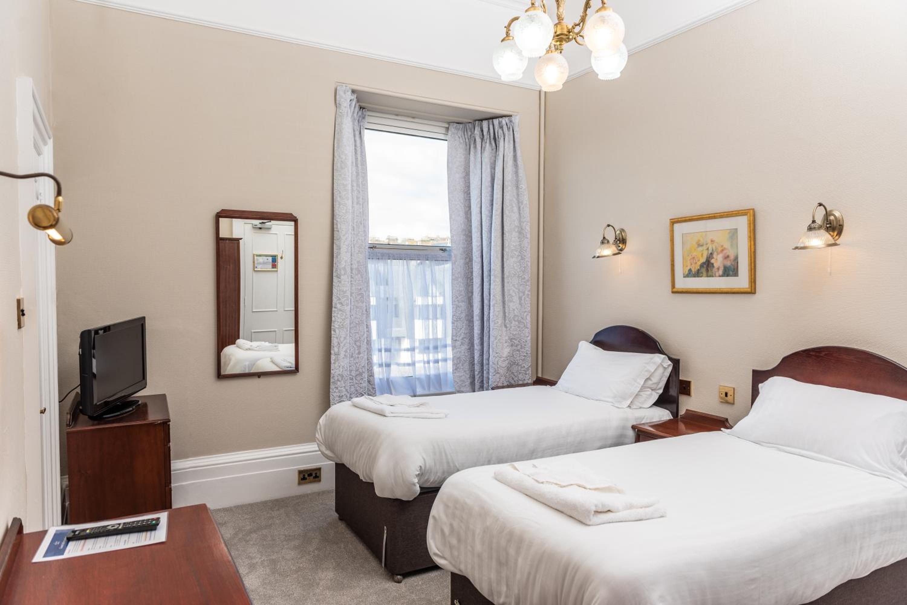 QUEENS HOTEL — 9