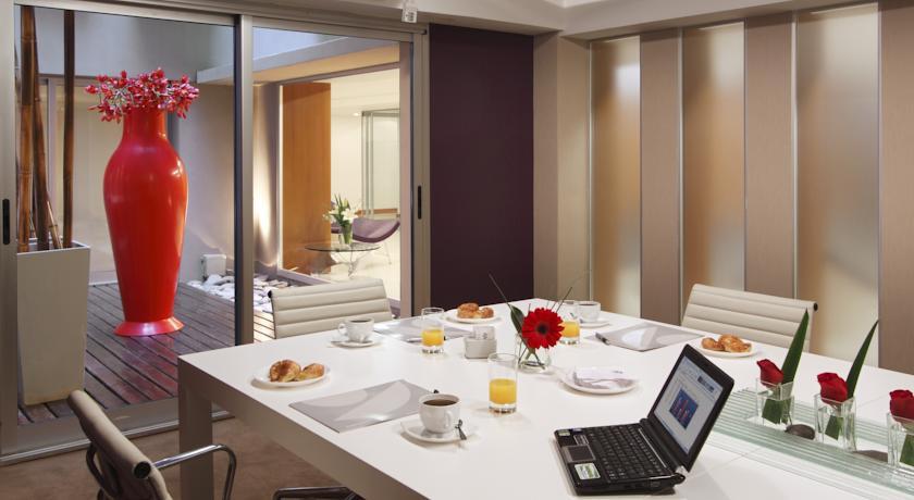 ASPEN SUITES — 7